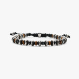 Bracelet with black, brown, and silver beads on a white background
